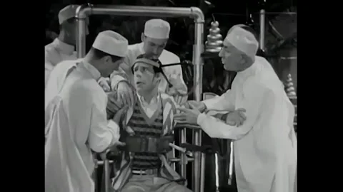 US - 1930 - in this comedy, a team of doctors performs a wacky test and Stock Footage 340582461