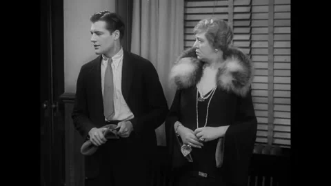US - 1930 - in this drama, two people from a working class background explain to Stock Footage 337947569