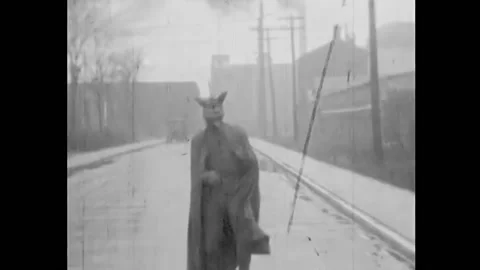 US - 1930 - in this silent fantasy, the devil dances on the street, with a Video stock 259551309
