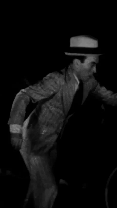 US - 1931 - in this comedy, a criminal loops a rope around a balcony post. When Stock Footage 340200666