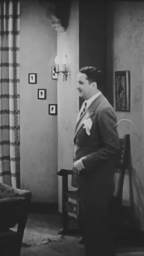 US - 1931 - in this comedy, a man overhears his fiancﾎe with her lover. When the Stock Footage 339782156