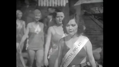 US - 1931 - in this comedy, models model bathing suits. In the next scene, a Stock Footage 340582514