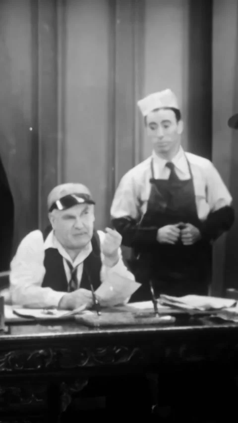 US - 1931 - in this comedy, a newspaper editor harshly scolds his reporters, Stock Footage 340200622