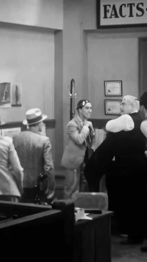 US - 1931 - in this comedy, a newspaper editor instructs his staff about a Stock Footage 340200868