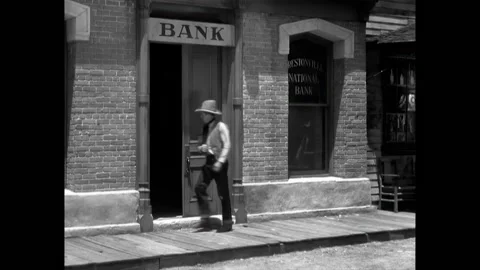 US - 1931 - in this western, when a rancher enters a bank, two cowboys devise a Stock Footage 323263183
