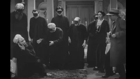 US - 1932 - in this comedy, two men are trying to hypnotize each other. A drunk Stock Footage 272393896
