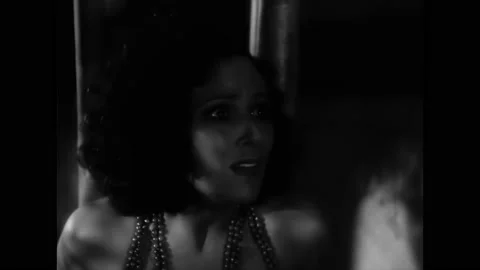 US - 1932 - in this drama, a captive native woman tells her American boyfriend Stock Footage 327681701