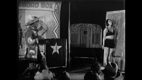 US - 1933 - A man is nearly robbed at a circus performance. Stock Footage 340585805