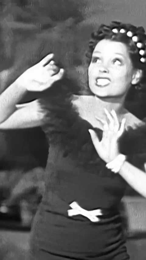 US - 1934 - in this comedy, during her performance, a singer glances jealously Stock Footage 340196210