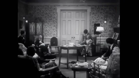 US - 1934 - in this comedy, a man gives a radio show from his home while his Stock Footage 301524448