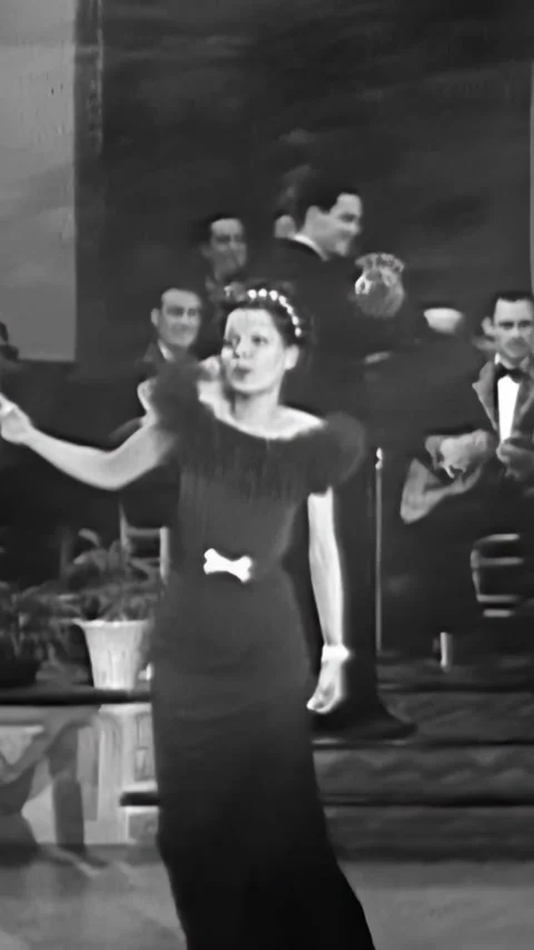 US - 1934 - in this comedy, a singer glances jealously at a man making himself Stock Footage 340196187