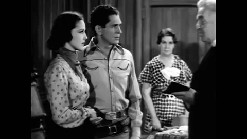 US - 1937 - in this western, when a man and a woman hastily get married, a Stock Footage 325216300