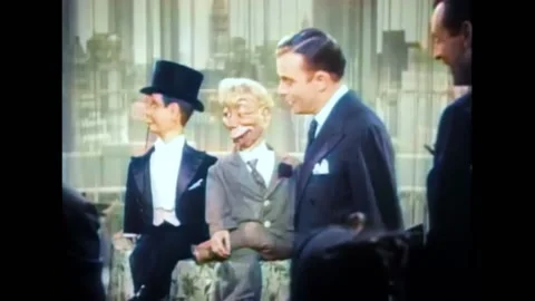 US - 1938 - in this comedy, a ventriloquist entertains a party crowd with two Stock Footage 296399026