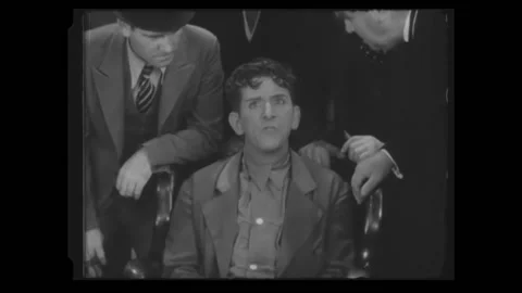 US - 1938 - in this parody, a group of detectives and a prosecutor are Stock Footage 254199708