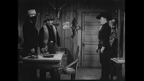 US - 1942 - in this western, a man posing as a corrupt investigator meets with Stock Footage 340591162