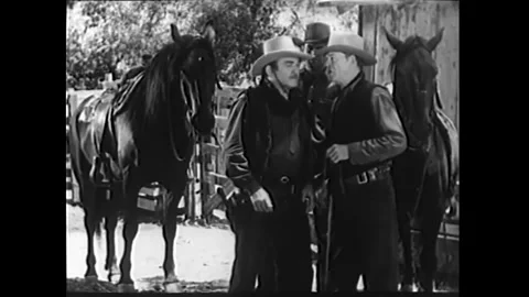 US - 1942 - in this western, a marshal talks to a woman on her porch when he Stock Footage 340591161