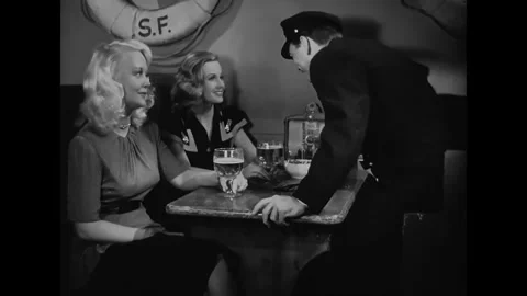 US - 1947 - in this drama, a lighthouse worker joins his girlfriend at a bar. Vídeos de archivo 337956367
