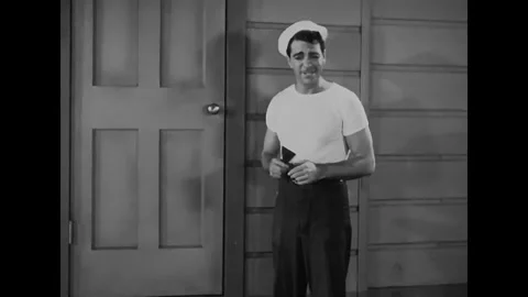 US - 1947 - in this drama, a lighthouse worker pretends to have a toothache to Stock Footage 337956440