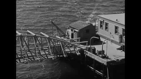 US - 1947 - in this drama, a lighthouse worker is shocked when he meets his Stock Footage 337956901