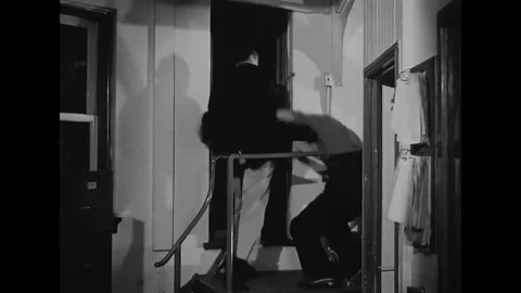 US - 1947 - in this drama, a lighthouse worker attacks his injured boss. The Stock Footage 337957777