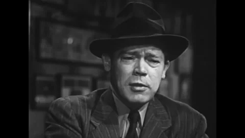 US - 1949 - in this drama, two men, having drinks at a bar, discuss the hatred Stock Footage 340653747