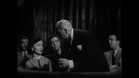 US - 1950 - in this comedy, a drunk man leaves the theater when he realizes he's Stock Footage 341981330