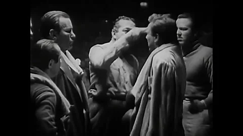 US - 1950 - in this comedy, a referee explains the rules to two boxers, hitting Stock Footage 341981336