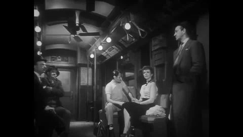 US - 1953 - in this thriller, five passengers travel on a subway train in the Stock Footage 340589368