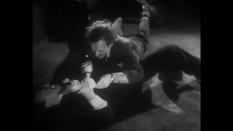 US - 1953 - in this thriller, two men traveling by subway fight for an ax. Other Stock Footage 340589387