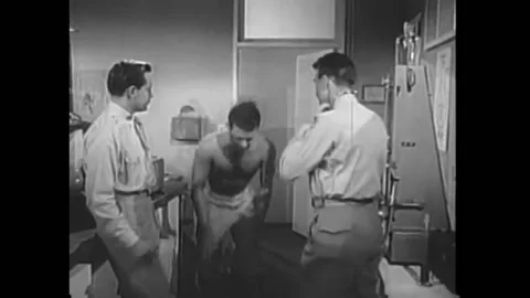 US - 1955 - in this drama, doctors perform various tests on pilots while a Stock Footage 316636668