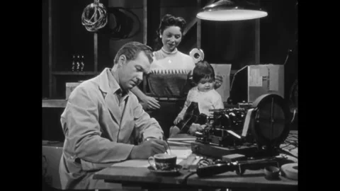 US - 1955 - in this drama, an engineer works day and night on a machine he Stock Footage 337971635