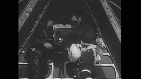 US - 1955 - in this drama, a pilot is prepared for a parachute jump, fitted with Stock Footage 316636990