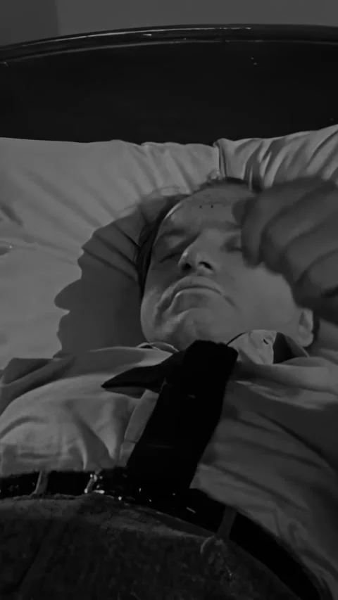 US - 1955 - in this science fiction film, doctors examine a brain scan of a Stock Footage 340290553