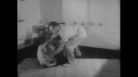 US - 1956 - in this drama, a multiple sclerosis patient goes through physical Stock Footage 316636271