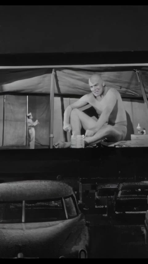 US - 1958 - in this romance, a couple is watching a movie about a giant man in a Stock Footage 340291432