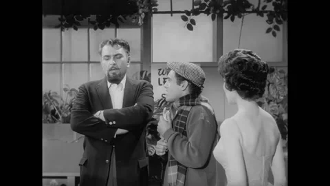 US - 1960 - in this comedy, a man begs his boss not to fire him and give him a Stock Footage 296409415