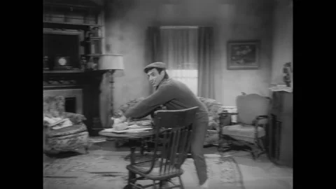 US - 1960 - in this comedy, a man reluctantly looks at his bedridden mother's Stock Footage 296402053