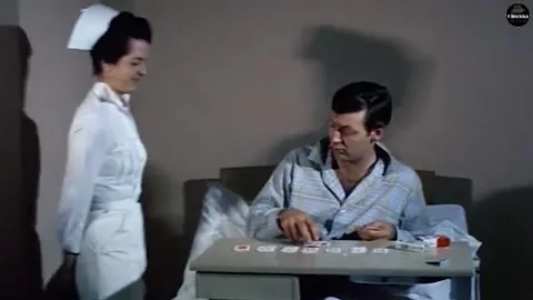 US - 1965 - in this comedy, a nurse interrupts a patient playing solitaire to Stock Footage 328244972