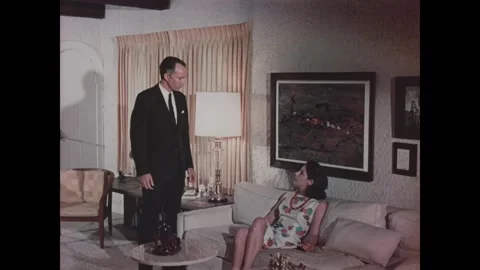 US - 1967 - in this drama, a man is surprised to find a stranger on his couch Stock Footage 341992314