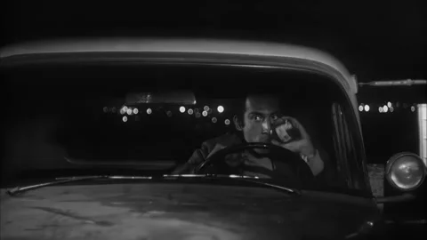 US - 1969 - in this drama, a man with a grudge follows a couple in their car and Stock Footage 337965843