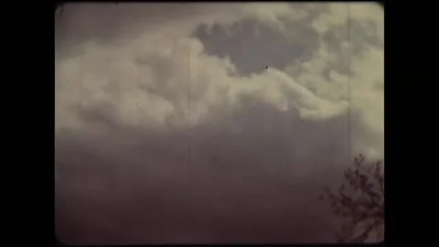 US - 1976 - in this documentary, people at home and work keep a lookout for any Stock Footage 325210529