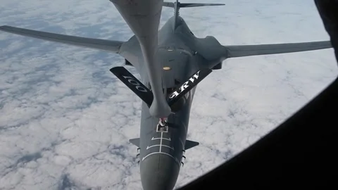 U.S. Air B-1B Lancer completes air-to-air refueling with KC-135 Stratotanker Stock Footage 264024664