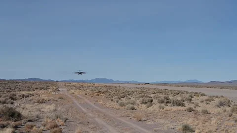 U.S. Air C-17 Globemaster III landing at Nevada Test and Training Range Stock Footage 294680035