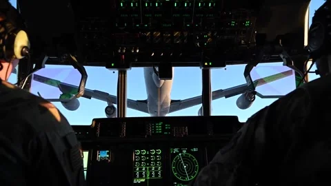 U.S. Air Commandos AC-130J Ghostrider gunship pilots conduct aerial refueling Stock Footage 258336061