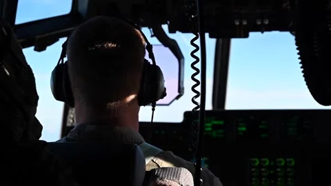 U.S. Air Commandos pilot flying AC-130J Ghostrider gunship aircraft Stock Footage 258336086