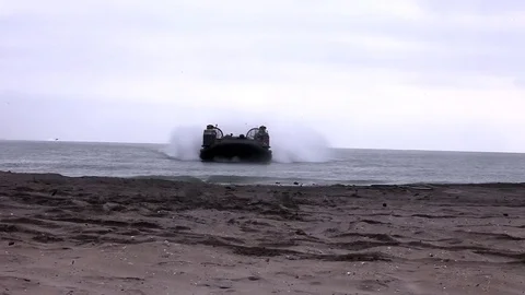 U.S. air-cushion vehicle getting close to the beach; Army exercises Video stock 84511264