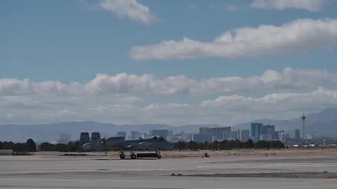 U.S. Air Force A-10 Thunderbolt taxiing at Nellis AFB, Las Vegas in distance Stock Footage 272588402