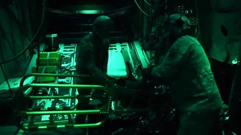 U.S Air Force Air Commandos crewmen load Howitzer gun on AC-130J Ghostrider Video stock 258336304
