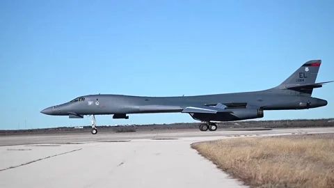 U.S. Air Force B-1B Lancer aircraft taxiing after landing Stock Footage 264024400