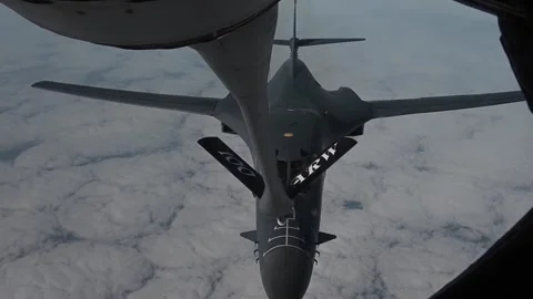 U.S. Air Force B-1B Lancer approaching boom for aerial refueling Stock Footage 264024715